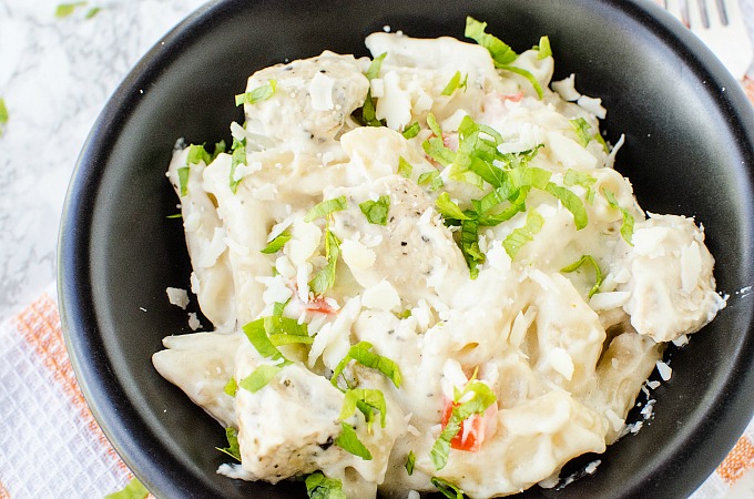 This creamy Lemon Slow Cooker Chicken Pasta recipe is super easy to make and is perfect to feed a crowd. Enjoy a delicious weeknight meal or dinner.