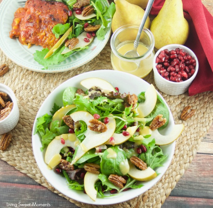 This tasty pomegranate Pear Salad is served with candied pecans and drizzled with a mustard dressing. The perfect autumn quick salad to serve with dinner.