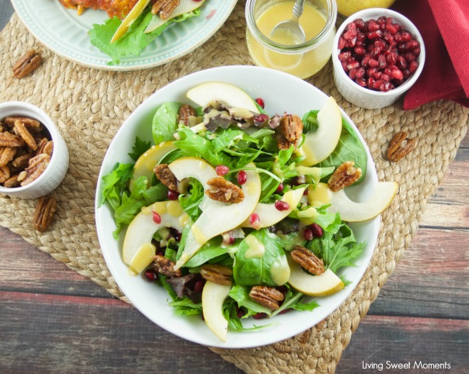 This tasty pomegranate Pear Salad is served with candied pecans and drizzled with a mustard dressing. The perfect autumn quick salad to serve with dinner.