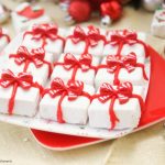 This delicious Gingerbread Holiday Fudge is perfect for Christmas parties and to give as DIY Gifts. Serve it in a present shape or decorate with sprinkles.