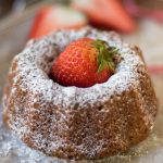 This delicious moist Mini Pumpkin Bundt Cake Recipe is the perfect elegant dessert for your Thanksgiving dinner or any other fall party. No frosting needed!