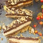 This crunchy No Bake Chocolate Peanut Butter Bars recipe have 4 layers of decadence. Enjoy peanut butter mousse, cookie base and chocolate ganache.