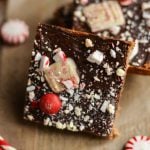 These soft and chewy Peppermint Blondies are covered in chocolate and sprinkled with candy. The perfect Holiday dessert recipe for parties and celebrations.