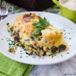 This delicious Ravioli Lasagna recipe is made with frozen ravioli, homemade Alfredo sauce, cheese and fresh spinach. The perfect quick weeknight dinner idea