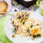 This delicious Ravioli Lasagna recipe is made with frozen ravioli, homemade Alfredo sauce, cheese and fresh spinach. The perfect quick weeknight dinner idea