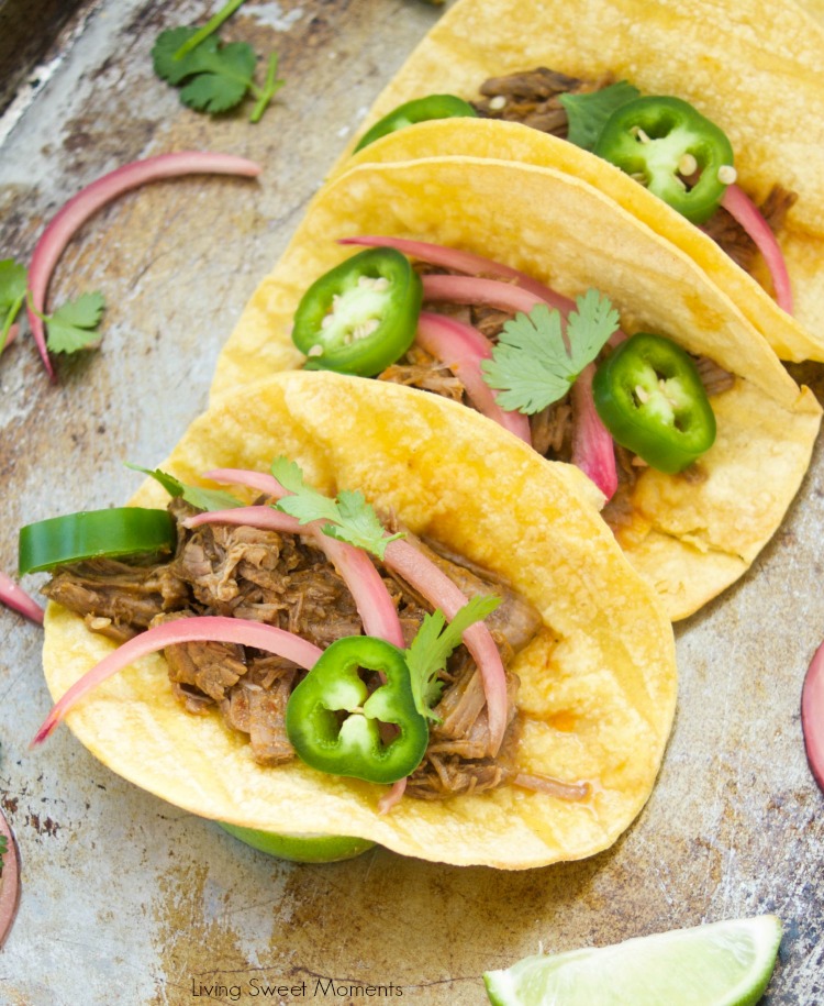 This scrumptious beef barbacoa tacos recipe is made quickly in the pressure cooker and served with homemade pickled onions. Perfect for dinner and parties.