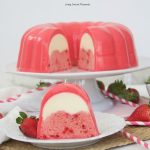 This decadent strawberry Flan Jello Cake Recipe is a 3 in 1. A Cake and flan encased in a refreshing jello shell. A showstopper dessert for any occasion.