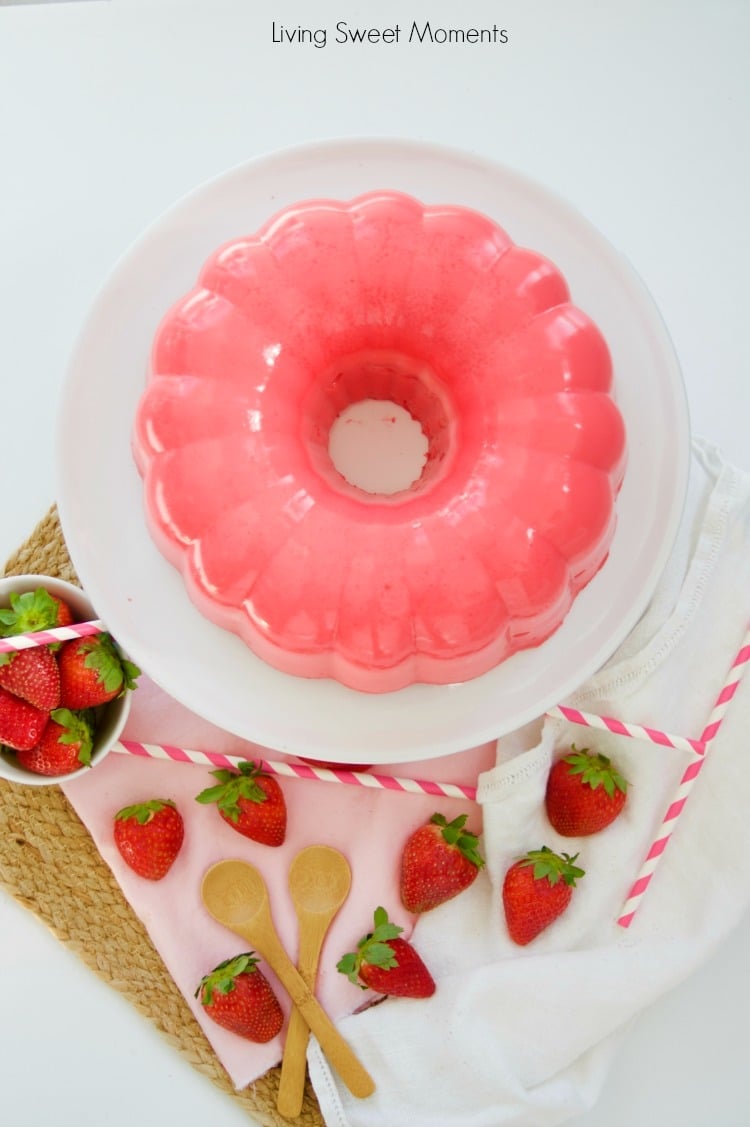 This decadent strawberry Flan Jello Cake Recipe is a 3 in 1. A Cake and flan encased in a refreshing jello shell. A showstopper dessert for any occasion.