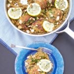 This delicious One Pot Chicken And Rice recipe is seasoned with za'atar and topped with lemon, almonds, and parsley. A delicious quick dinner idea.