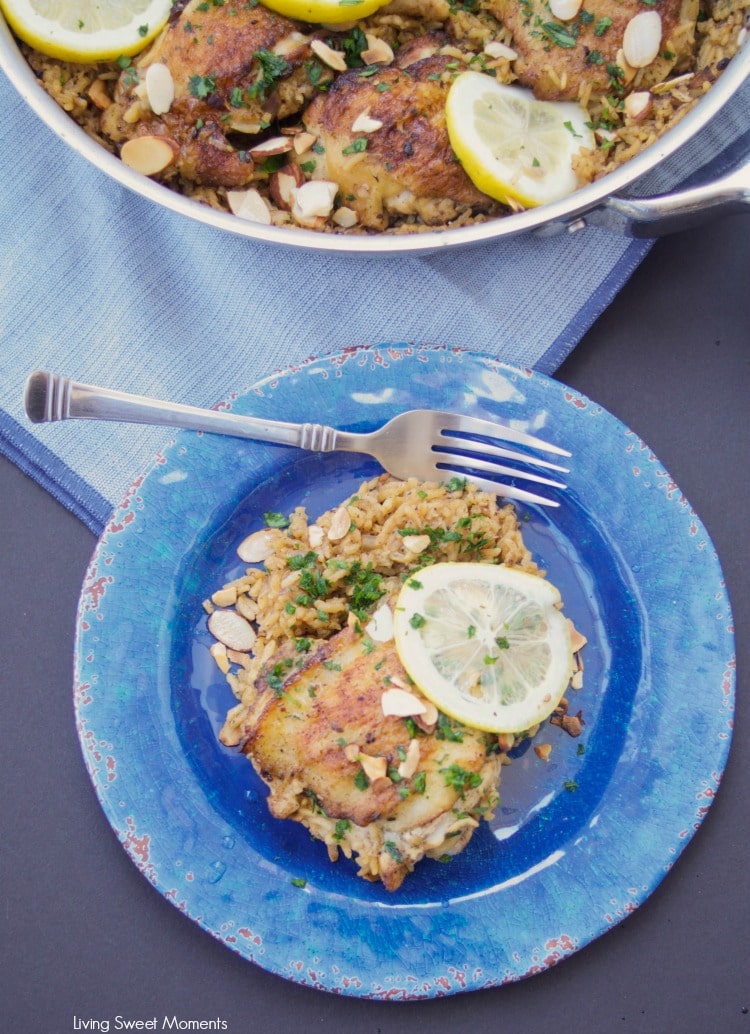 This delicious One Pot Chicken And Rice recipe is seasoned with za'atar and topped with lemon, almonds, and parsley. A delicious quick dinner idea.