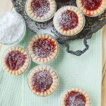 These delicious and tangy Strawberry Rhubarb Tarts are super easy to make and are the perfect mini desserts for any party. Top them with powdered sugar.