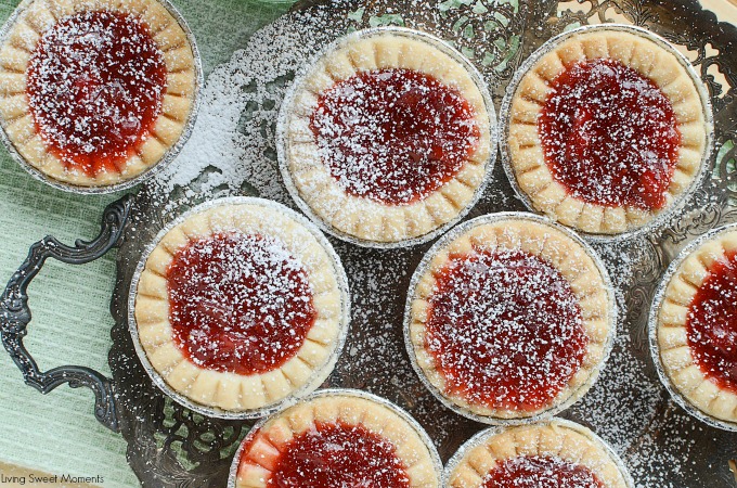 These delicious and tangy Strawberry Rhubarb Tarts are super easy to make and are the perfect mini desserts for any party. Top them with powdered sugar.