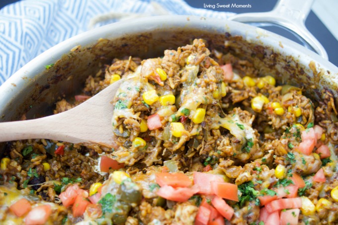 This amazing one pot cheesy Mexican Chicken And Rice recipe is made with authentic Mexican Mole sauce & topped with sesame seeds, for a quick 30-minute meal