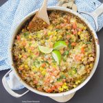 This amazing one pot cheesy Mexican Chicken And Rice recipe is made with authentic Mexican Mole sauce & topped with sesame seeds, for a quick 30-minute meal