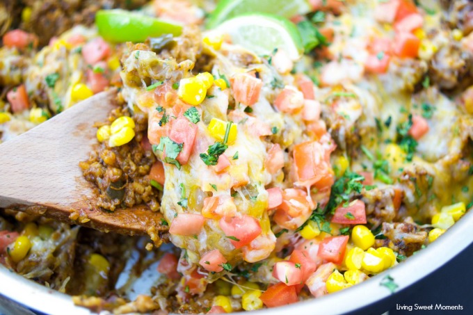 This amazing one pot cheesy Mexican Chicken And Rice recipe is made with authentic Mexican Mole sauce & topped with sesame seeds, for a quick 30-minute meal