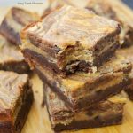 This soft and fudgy Peanut Butter Cheesecake Brownies recipe is super easy to make and perfect for dessert or snack. Enjoy 3 layers of chocolate goodness.