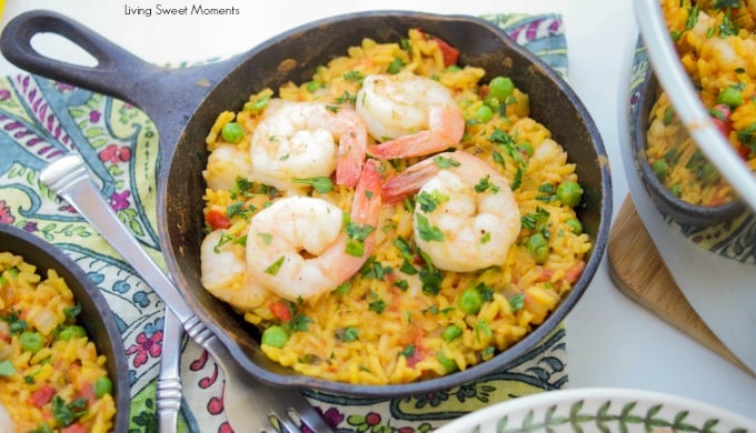 This delicious Spanish Shrimp With Yellow Rice recipe is super easy to make, ready in less than an hour, & feeds a crowd. Perfect for dinner or entertaining