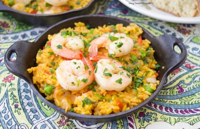 This delicious Spanish Shrimp With Yellow Rice recipe is super easy to make, ready in less than an hour, & feeds a crowd. Perfect for dinner or entertaining