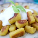 Delicious savory homemade plantain gnocchi is served with an amazing four cheese sauce. Perfect as a vegetarian entree for parties or celebrations.