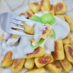 Delicious savory homemade plantain gnocchi is served with an amazing four cheese sauce. Perfect as a vegetarian entree for parties or celebrations.