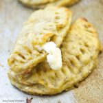 This amazing latin baked plantain empanadas recipe is filled with oozy cheese and is the perfect finger appetizer to any party or celebration