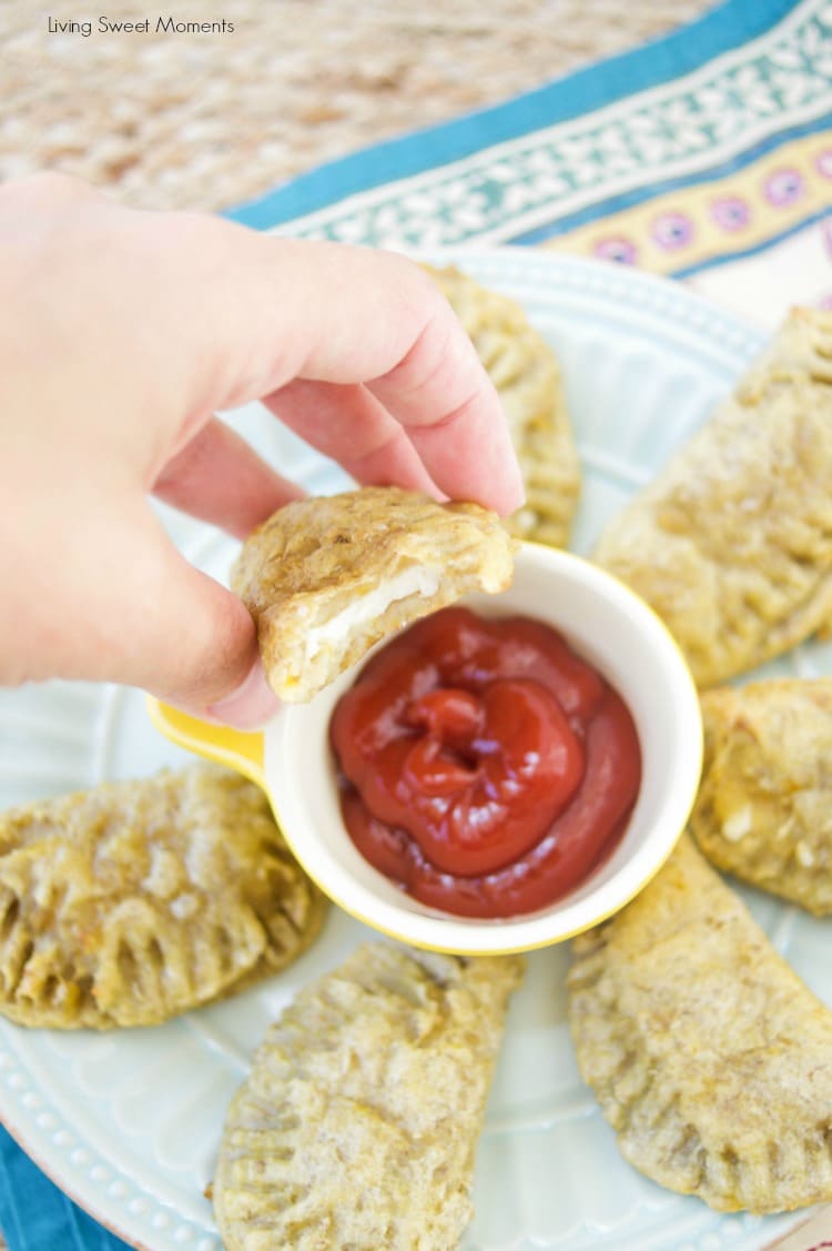 This amazing latin baked plantain empanadas recipe is filled with oozy cheese and is the perfect finger appetizer to any party or celebration