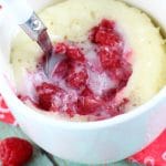 This moist and delicious Raspberry Sour Cream Mug Cake recipe is ready in 4 minutes or less and is topped with a yummy Vanilla Glaze. A quick dessert idea