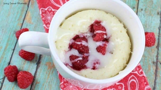 This moist and delicious Raspberry Sour Cream Mug Cake recipe is ready in 4 minutes or less and is topped with a yummy Vanilla Glaze. A quick dessert idea