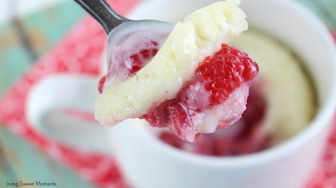 This moist and delicious Raspberry Sour Cream Mug Cake recipe is ready in 4 minutes or less and is topped with a yummy Vanilla Glaze. A quick dessert idea