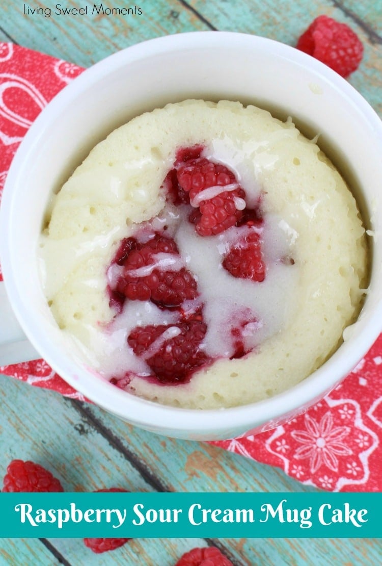 This moist and delicious Raspberry Sour Cream Mug Cake recipe is ready in 4 minutes or less and is topped with a yummy Vanilla Glaze. A quick dessert idea