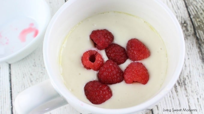 This moist and delicious Raspberry Sour Cream Mug Cake recipe is ready in 4 minutes or less and is topped with a yummy Vanilla Glaze. A quick dessert idea