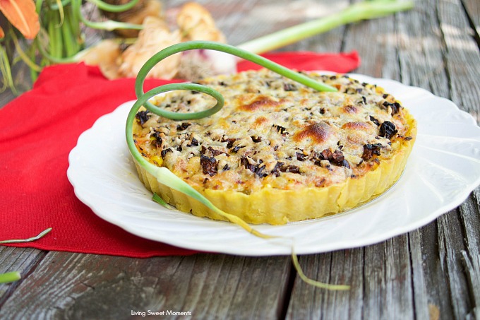 This delicious Summer Vegetable Tart recipe is filled with corn, shallots, mushrooms, creme fraiche and shredded gruyere cheese. A perfect vegetarian entree