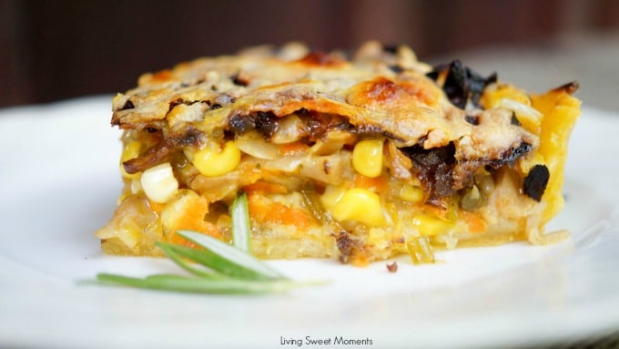 This delicious Summer Vegetable Tart recipe is filled with corn, shallots, mushrooms, creme fraiche and shredded gruyere cheese. A perfect vegetarian entree