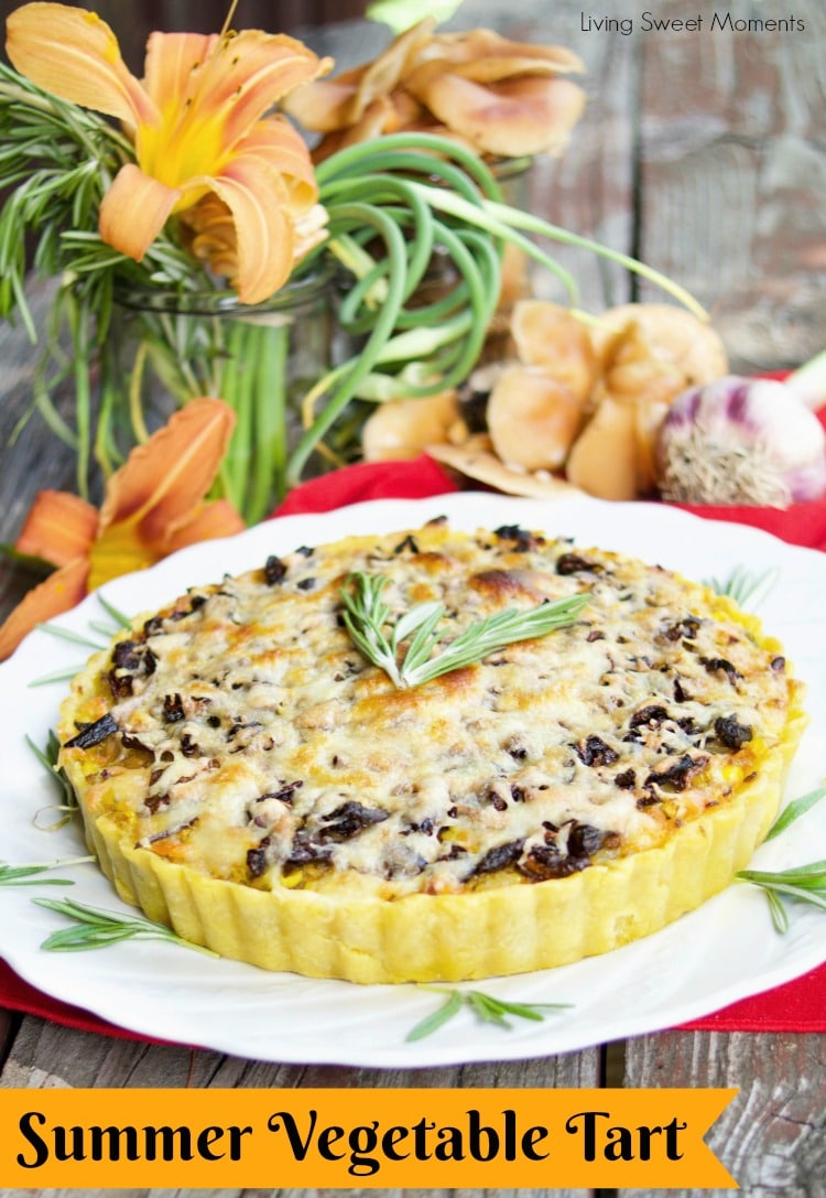 This delicious Summer Vegetable Tart recipe is filled with corn, shallots, mushrooms, creme fraiche and shredded gruyere cheese. A perfect vegetarian entree