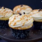 These decadent Salted Caramel Cupcakes are healthier, flourless, & high in protein. Served with creamy frosting and caramel sauce. Dessert without the guilt