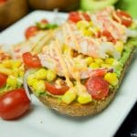 Looking for the best avocado toast recipe? You're in luck! This amazing Spicy Shrimp Avocado Toast is perfect for a quick & easy dinner or lunch idea.