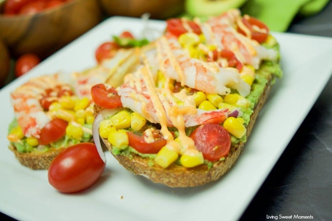 Looking for the best avocado toast recipe? You're in luck! This amazing Spicy Shrimp Avocado Toast is perfect for a quick & easy dinner or lunch idea.