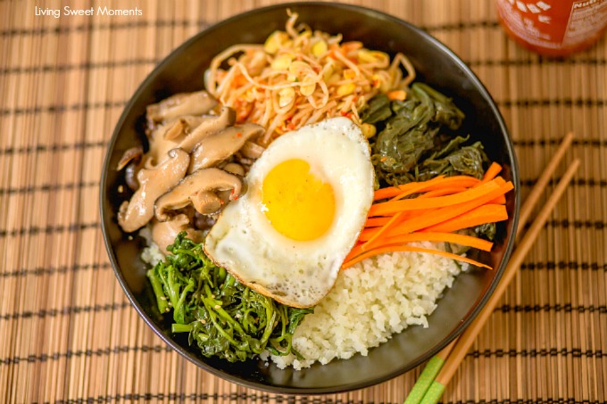 This amazing Korean Cauliflower Bibimbap recipe is delicious, low-carb, keto friendly, and easy to make. The perfect quick vegetarian weeknight dinner idea. Closeup of the bowl with fried egg