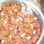 Enjoy a creamy beet risotto recipe made with roasted beets, arborio rice & goat cheese served in a skillet