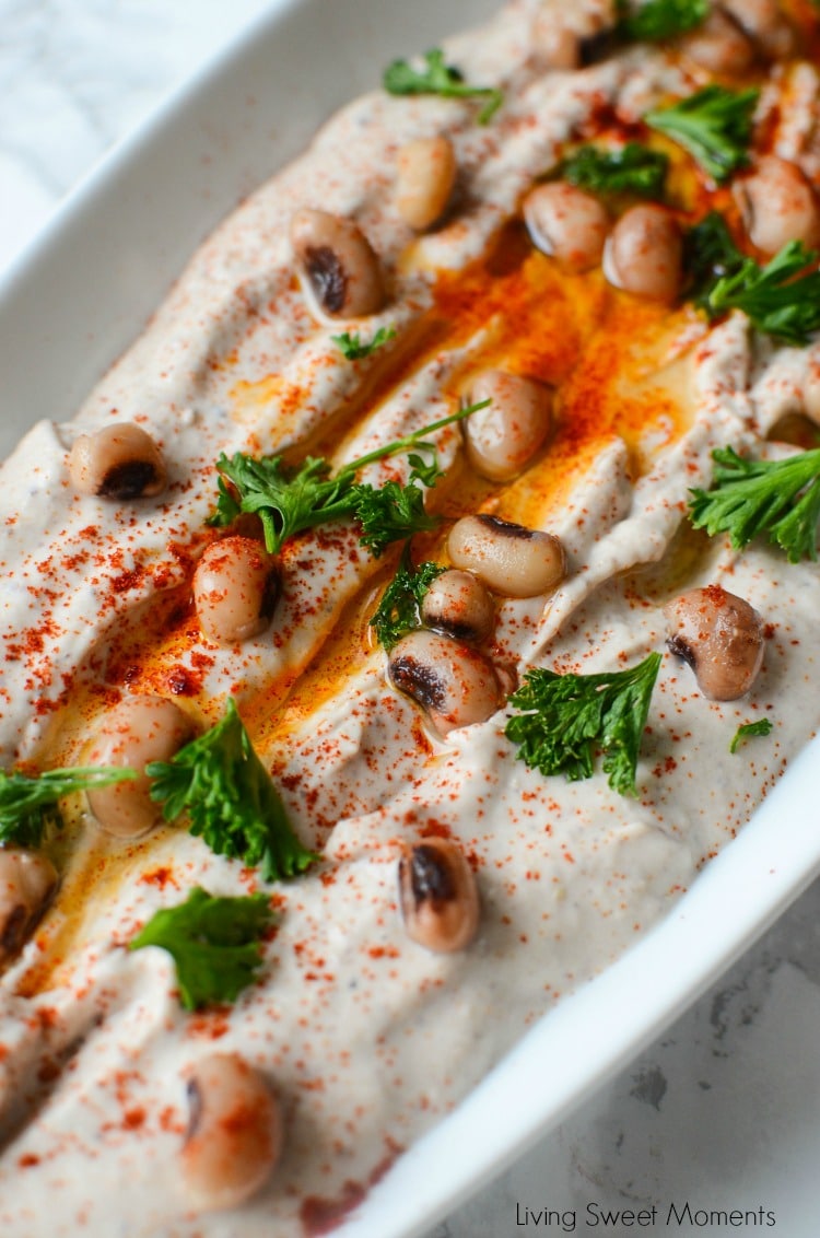 Entertain in style! This savory Black Eyed Pea Hummus recipe is the perfect appetizer to serve with pita chips and crackers. A delicious flavorful spread closeup
