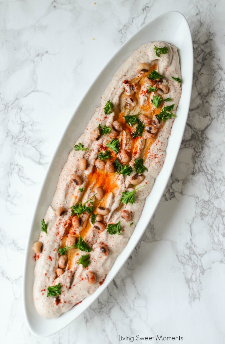 Entertain in style! This savory Black Eyed Pea Hummus recipe is the perfect appetizer to serve with pita chips and crackers. A delicious flavorful spread. Whole narrow white dish