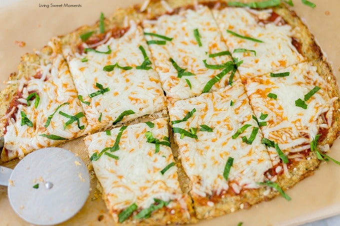 This keto friendly Cauliflower Pizza Crust is crispy, delicious, low-carb, and super easy to make. Top with your favorite sauce and veggies & it'll be a hit