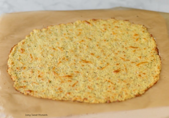 This keto friendly Cauliflower Pizza Crust is crispy, delicious, low-carb, and super easy to make. Top with your favorite sauce and veggies & it'll be a hit