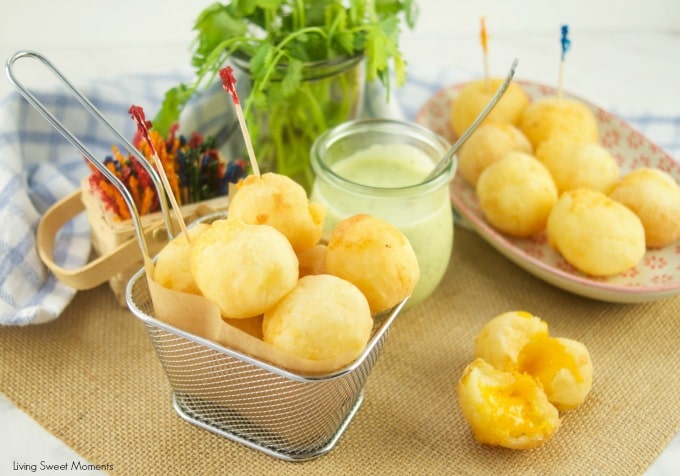 These amazing Cheese Stuffed Yuca Balls are crispy, delicate, and so cheesy! Served with a cilantro aioli. Perfect as bite-size appetizers for entertaining.