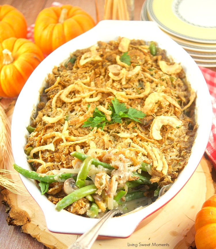 I've fancied up a classic Thanksgiving dish. This creamy Green Bean Casserole From Scratch recipe has lot's of onions, mushrooms, and green beans, & Gruyere cheese. Green beans facing out showing the creamy interior