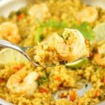 This delicious Curried Riced Cauliflower recipe with shrimp is low carb, paleo and keto friendly. Taking a bite out of this quick dinner.