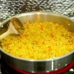 This delicious Curried Riced Cauliflower recipe with shrimp is low carb, paleo and keto friendly. Skillet showing the in process curry rice