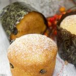 This easy Easy Mini Panettone recipe is delicious, flavorful, and quick to make. Vertical photo showing the mini panettone filled with orange and raisins