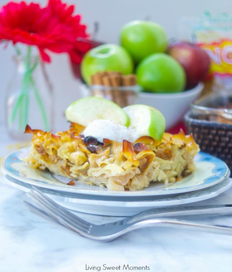 This delicious Apple Noodle Kugel recipe is both sweet and savory. A slice of kugel with apples and a shiny fork