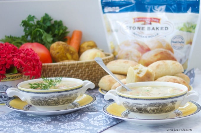 This creamy Potato Dumpling Soup recipe is the perfect hearty vegetarian soup. Shown here 2 soup bowls with pepperidge farm stone baked artisan rolls